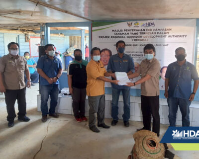 HDA hands out compensation cheques to community members of Long Wat, Long Atip