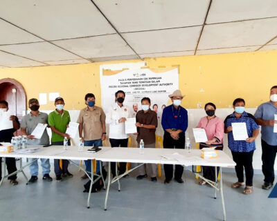 HDA Crop Compensation Cheques for residents in Long Banyok