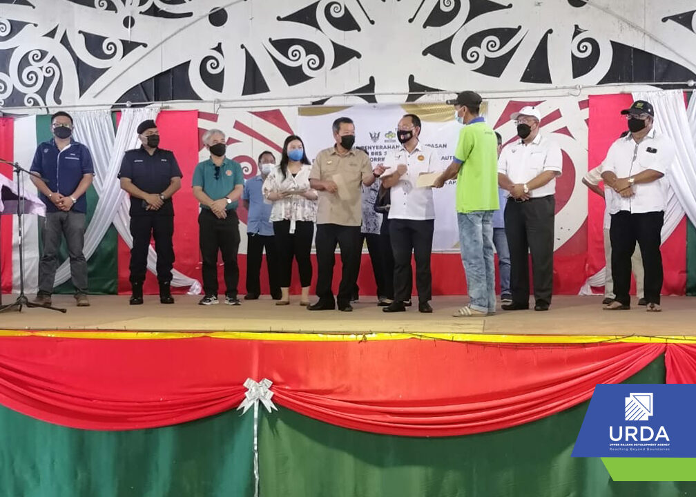 Cheque compensation ceremony by YB Tuan Kennedy Chukpai Ugon