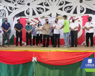 Cheque compensation ceremony by YB Tuan Kennedy Chukpai Ugon