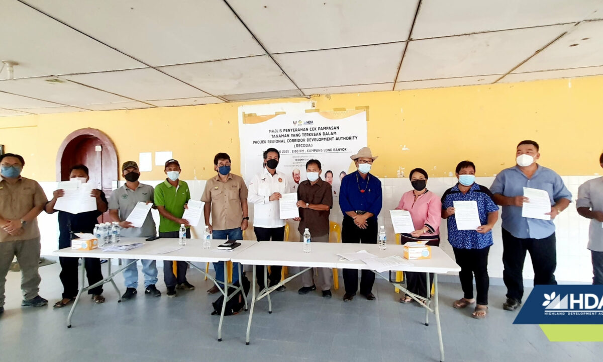 HDA Crop Compensation Cheques for residents in Long Banyok